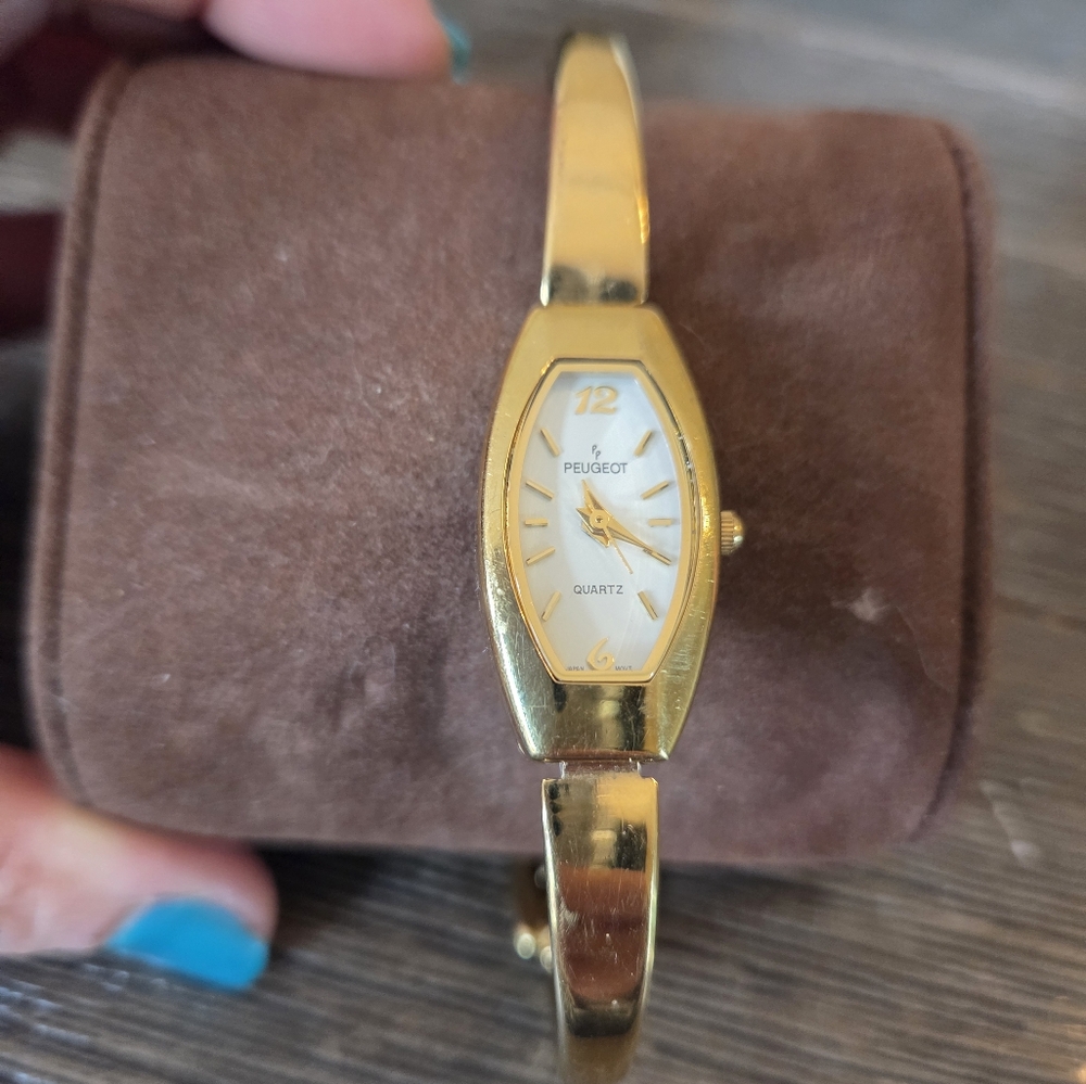 Peugeot Gold Oval Watch with Bangle Bracelet